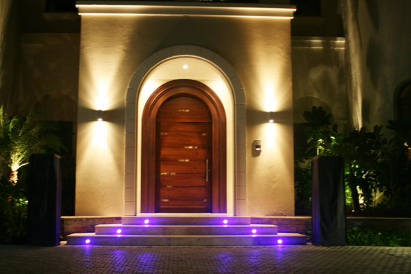 Create visual depth by layering exterior wall lighting available from Eco Industrial Supplies